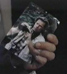 Tom's Photo in Dee's purse.